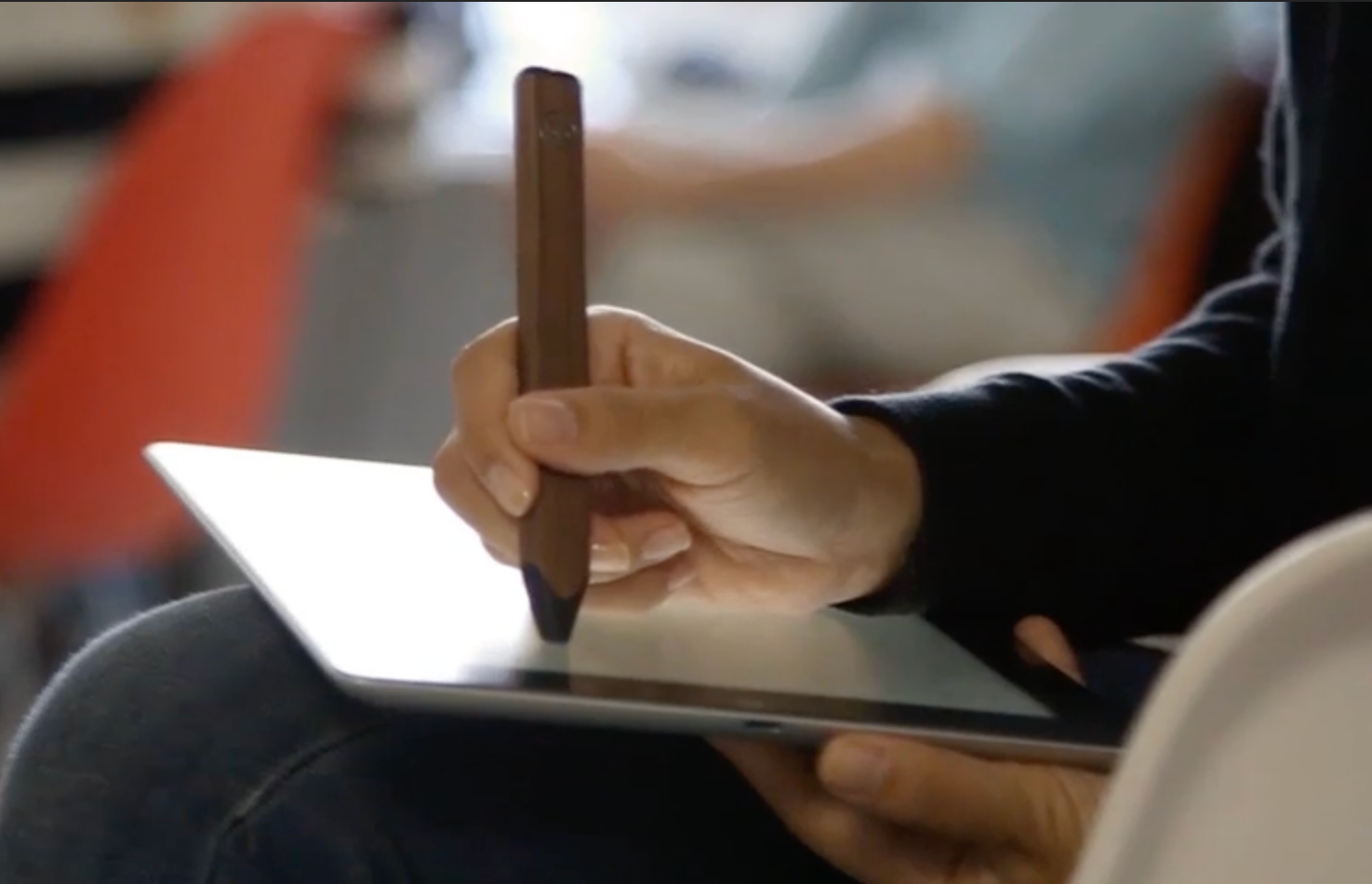 a person using the Pencil stylus on their tablet